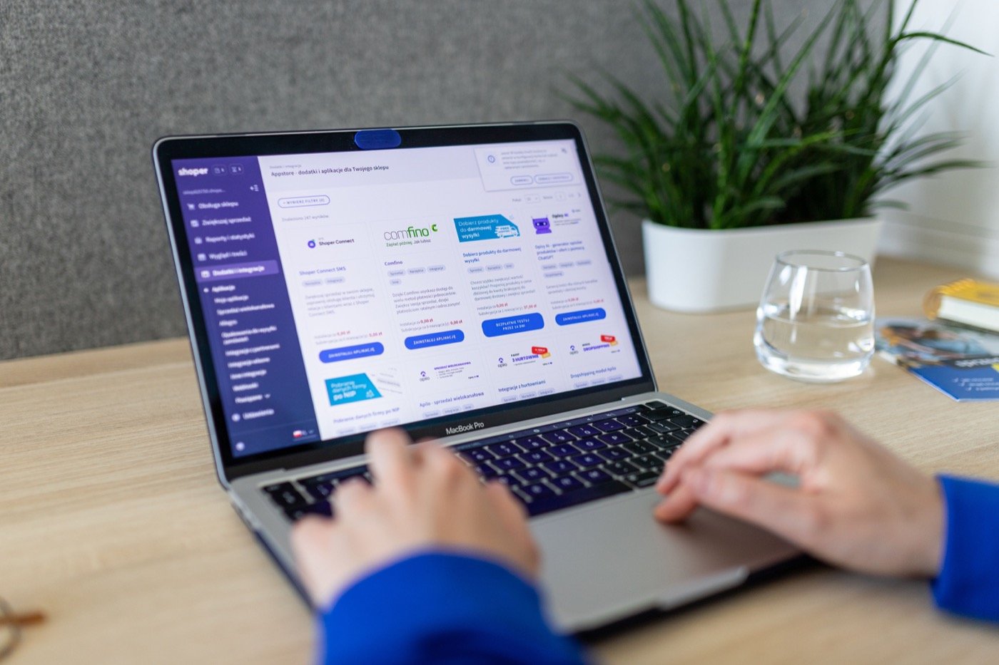 Hands integrating Shopify apps